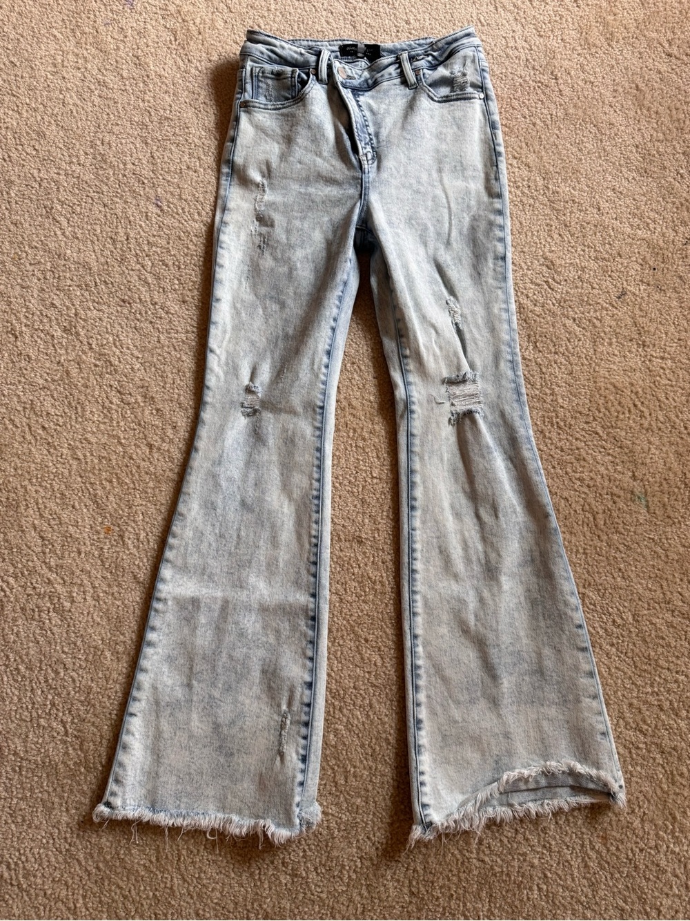 Light Blue Flare Jeans with Distressed Details